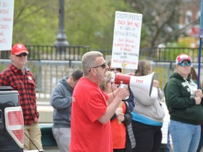 Elementary Teachers Federation of Ontario President Sam Hammond addresses a crowd at a rally outside the constituency office of Bruce-Grey-Owen Sound MPP and Minister of Government and Community Services Bill Walker on Friday, in Owen Sound.