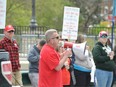 Elementary Teachers Federation of Ontario President Sam Hammond addresses a crowd at a rally outside the constituency office of Bruce-Grey-Owen Sound MPP and Minister of Government and Community Services Bill Walker on May 31, 2019, in Owen Sound.