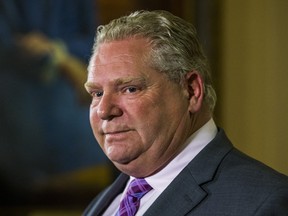 Ontario Premier Doug Ford and Minister of Municipal Affairs and Housing Steve Clark (not pictured), address media outside of the Premier's office at Queen's Park in Toronto, Ont. on Monday May 27, 2019.