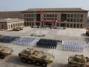 This photo taken on August 1, 2017 shows Chinese People's Liberation Army personnel attending the opening ceremony of China's new military base in Djibouti.
