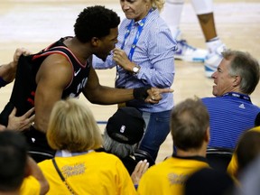 Kyle Lowry gets upset at a man after he shoved the basketball players in the second half against the Golden State Warriors during Game Three of the 2019 NBA Finals at ORACLE Arena on June 05, 2019 in Oakland, California.