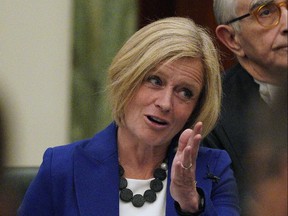 Alberta's NDP Opposition Party Leader Rachel Notley (left) speaks at the Alberta Legislature on Monday May 13, 2019.