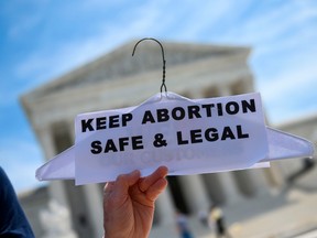 In this file photo taken on May 21, 2019 Abortion rights activists rally in front of the US Supreme Court in Washington, DC.