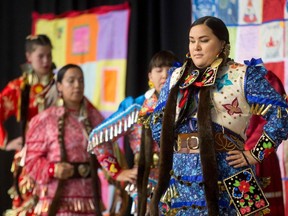 Jingle Dancers perform at the closing ceremony marking the conclusion of the National Inquiry into Missing and Murdered Indigenous Women and Girls at the Museum of History in Gatineau, Quebec on June 3, 2019.