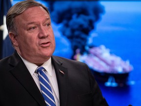 In this file photo taken on June 13, 2019 U.S. Secretary of State Mike Pompeo delivers remarks to the media at the State Department in Washington, D.C.
