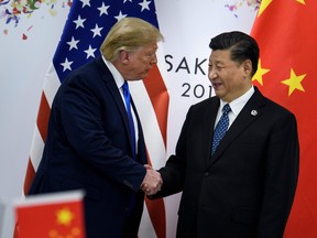 China's President Xi Jinping  greets U.S. President Donald Trump before a bilateral meeting on the sidelines of the G20 Summit in Osaka.