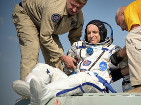 Expedition 59 astronaut David Saint-Jacques of the Canadian Space Agency (CSA) is helped out of the Soyuz MS-11 spacecraft just minutes after he, NASA astronaut Anne McClain, and Roscosmos cosmonaut Oleg Kononenko, landed in Kazakhstan on June 25, 2019.