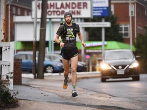 Michael Wardian runs to work in Arlington, Va., in 2016.