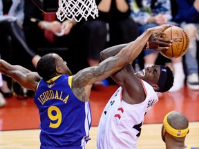 Golden State Warriors guard Andre Iguodala (9) blocks the shot of Toronto Raptors forward Pascal Siakam (43) during the third quarter in game two of the 2019 NBA Finals at Scotiabank Arena.
