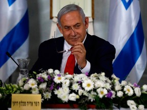 Prime Minister Benjamin Netanyahu presides over a meeting of the Israeli cabinet in the settlement of Qela Bruchim in the Israeli-annexed Golan Heights on June 16, 2019.