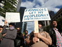 People protest Quebec's new Bill 21, which will ban teachers, police, government lawyers and others in positions of authority from wearing religious symbols such as Muslim head coverings and Sikh turbans, in Montreal, June 17, 2019.