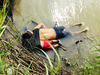 The drowned bodies of Salvadoran migrant Oscar Alberto Martinez Ramirez and his daughter Valeria lie the Rio Bravo river in Matamoros, in Tamaulipas state, Mexico, June 24, 2019.