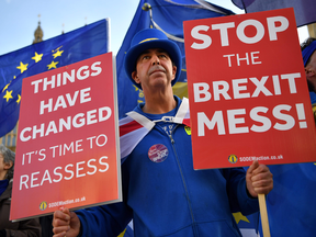 Anti-Brexit demonstrators protest outside of the Houses of Parliament in London on Nov. 14, 2018.