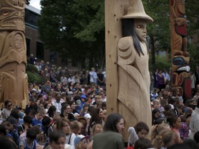 One Reconciliation Pole and two Welcome Figures were unveiled during a ceremony in honour of truth and reconciliation on National Peoples Indigenous Day at the Vancouver School District in Vancouver, B.C., on Friday, June 21, 2019.