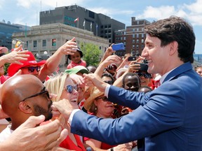 Prime Minister Justin Trudeau greets Canadians during Canada Day festivities on Parliament Hill in Ottawa, Ontario, Canada July 1, 2019.