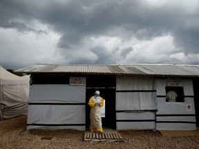 A health worker wearing Ebola protection gear, leaves the dressing room before entering the Biosecure Emergency Care Unit (CUBE) at the ALIMA (The Alliance for International Medical Action) Ebola treatment centre in Beni, in the Democratic Republic of Congo, March 30, 2019.