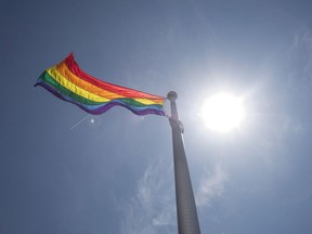 A rainbow flag is seen at Toronto City Hall in Toronto on Tuesday, May 31, 2016. There won't be any rainbow crosswalks in Moncton, N.B., this year while city officials await a national report looking into the safety of the crossings.