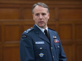 The commander of Canada's air force is rolling out a series of initiatives and exploring several others, including retention and signing bonuses, to address the military's shortage of experienced pilots. Royal Canadian Air Force Commander Lt.-Gen. Al Meinzinger waits to appear before the House of Commons public accounts committee on Parliament Hill in Ottawa, Monday, Dec. 3, 2018.