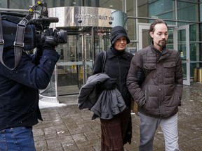 Jennifer and Jeromie Clark, leave a sentencing hearing after to couple were found guilty of criminal negligence causing the death of their 14-month-old son in 2013, outside the courts centre in Calgary, Friday, Feb. 8, 2019. Calgary parents convicted in the death of their 14-month-old son are to learn their sentences today.THE CANADIAN PRESS/Jeff McIntosh