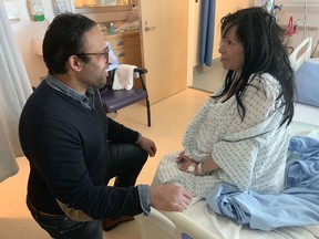 Dr. Monty Ghosh, an addictions and internal medicine specialist at the University of Alberta, speaks with a patient in Calgary on Thursday, June 20, 2019, in this handout photo. Ghosh is working on a new pilot project in Calgary that aims to ensure recently-released prison inmates have access to screening and treatment for Hepatitis C.