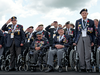 Canadian Second World War veterans stand for the national anthem during a ceremony on Juno Beach as part of D-Day 75th anniversary commemorations in Normandy, France, on June 6, 2019.