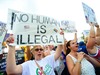 People protest outside a rally where Donald Trump officially launched his re-election campaign on June 18, 2019 in Orlando, Florida.