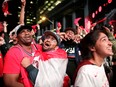 Fans celebrate in Toronto after the Toronto Raptors defeated the Golden State Warriors in Oakland, Calif., in Game 6 of the NBA Finals, on June 14, 2019.