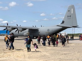 Hercules C-130 aircraft have been air lifting Pikangikum First Nation members out of the community to Sioux Lookout.