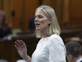 Environment Minister Catherine McKenna rises during Question Period in the House of Commons on Parliament Hill in Ottawa on Thursday, June 13, 2019. A coalition of oil and gas industry groups, chambers of commerce and manufacturers associations say there is no room to fix the government's environmental assessment legislation. The Save Canadian Jobs coalition is changing their slogan from "fix bill C-69" to "stop bill C-69" after the government rejected most of the changes proposed last week by the Senate. Environment Minister Catherine McKenna said she would accept 99 Senate amendments but rejected those which she says would have made it optional to ensure the impact on Indigenous rights and climate change were taken into account when deciding.
