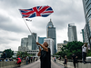 A protester waves a British flag near the government headquarters during a rally against the extradition bill on June 12, 2019 in Hong Kong, China.
