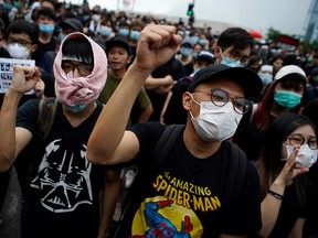 Protesters attend a demonstration demanding Hong Kong's leaders step down and withdraw the extradition bill, in Hong Kong on June 17, 2019.