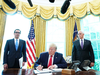 U.S. President Donald Trump signs ‘hard-hitting sanctions’ on Iran’s supreme leader, along with Secretary of Treasury Steven Mnuchin and Vice President Mike Pence, at the White House on June 24, 2019.