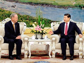 Former prime minister Jean Chretien meets with Xi Jinping, then vice-president of China, in Beijing in a Nov. 21, 2011, file photo provided by China's Xinhua News Agency.