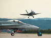 A Canadian Forces CF-18 Hornet comes in for a landing at CFB Bagotville, Quebec.