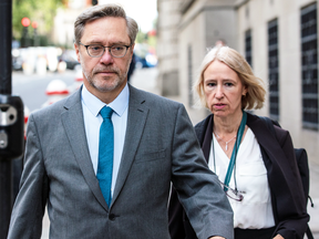 John Letts and Sally Lane in London, England in September 2018 to face charges of making money available for suspected terrorist activities. A conviction on one charge has left them destitute, Letts says.