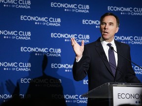 Finance Minister Bill Morneau addresses an Economic Club of Canada breakfast in Calgary, Wednesday, June 19, 2019.THE CANADIAN PRESS/Jeff McIntosh