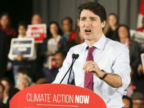 Prime Minister Trudeau holds a rally on climate change in Toronto in March. His government has introduced into the House of Commons a motion to declare a “climate emergency” in Canada.