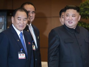 In this March 1, 2019, file photo, North Korean leader Kim Jong Un, right, accompanied by Kim Yong Chol, left, vice chairman of Worker's Party of Korea, meets Nguyen Thi Kim Ngan, chairwoman of Vietnam's National Assembly, at the National Assembly in Hanoi, Vietnam.