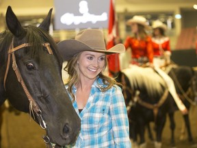 The Calgary Stampede introduces Heartland television series star Amber Marshall as the 2019 Calgary Stampede Parade Marshal in Calgary, Alta. on Wed., June 5, 2019. She poses with co-star horse Stormy called Spartan in the series.