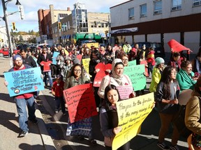 Participants take part in the Sisters in Spirit march in downtown Sudbury, Ont. on Thursday October 4, 2018. The event was held to remember and honour missing and murdered Indigenous women and girls.