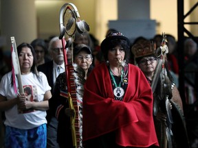 Women march during the closing ceremony of the National Inquiry into Missing and Murdered Indigenous Women and Girls in Gatineau, Que., on June 3, 2019.