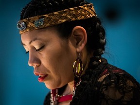 Lorelei Williams, whose cousin Tanya Holyk was murdered by serial killer Robert Pickton and whose aunt Belinda Williams went missing in 1978, pauses while responding to the report on the National Inquiry into Missing and Murdered Indigenous Women and Girls on Monday June 3, 2019.