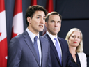 Prime Minister Justin Trudeau speaks during a news conference about the government's decision on the Trans Mountain Expansion Project, with Finance Minister Bill Morneau and Environment Minister Catherine McKenna in Ottawa on June 18, 2019.