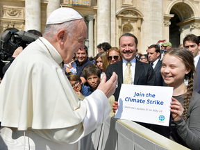 Pope Francis meets Swedish teenage climate activist Greta Thunberg during the weekly audience at Saint Peter's Square at the Vatican, April 17, 2019.