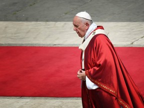 Pope Francis walks as he celebrates the Pentecost mass on June 9, 2019 In Saint Peter's square at the Vatican.