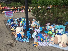 A memorial to commemorate the young girl who died earlier this year is shown outside the courthouse in Granby, Que., on Friday June 21, 2019.