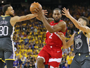 Toronto Raptor Kawhi Leonard to the basket against Stephen Curry and Klay Thompson of the Golden State Warriors during Game 4 of the NBA Finals.