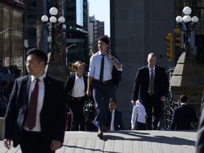 Prime Minister Justin Trudeau makes his way to Parliament Hill in Ottawa on Wednesday, June 12, 2019.