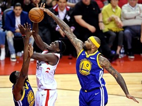 Golden State Warriors center DeMarcus Cousins (0) blocks a shot by Toronto Raptors forward Pascal Siakam (43) during the third quarter in game two of the 2019 NBA Finals at Scotiabank Arena.