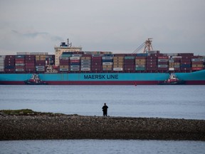 Tugboats guide the Anna Maersk container ship, carrying 69 containers of Canadian trash being returned from the Philippines, into port at Global Container Terminals to be unloaded, in Delta, B.C., on Saturday, June 29, 2019. The trash will be incinerated at Metro Vancouver's Waste-to-Energy Facility where waste is burned to generate electricity.